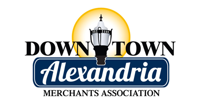 Logo for the Downtown Alexandria Merchants Association, featuring a classic streetlamp with a yellow glow behind it. "Downtown" is written above, and "Alexandria" in cursive on a blue background below.