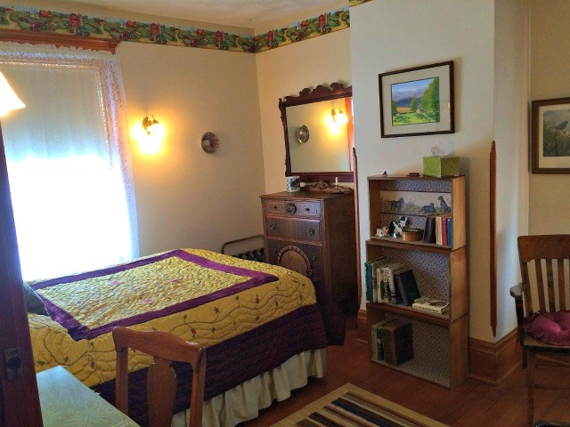 James Herriot room with a small library of his books.
