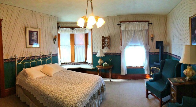 The Alma Anderson room has a cozy bay window seat and features a spacious French Thermo-Masseur whirlpool in a clawfoot tub with stand-up shower!