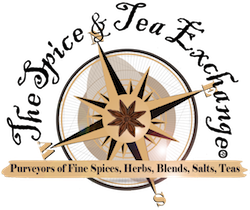 A compass rose with an anise star at its center, overlaid by the text: "Purveyors of Fine Spices, Herbs, Blends, Salts, Teas." Curved text around the compass reads "The Spice & Tea Exchange," highlighting our artisanal offerings.