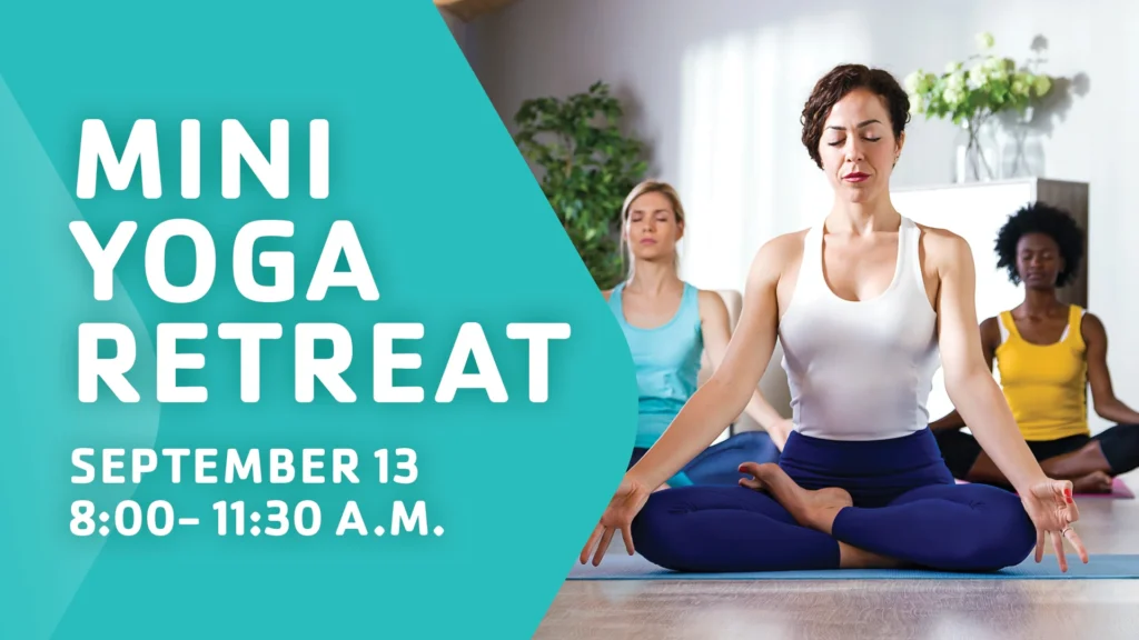 Four people sit cross-legged on yoga mats in a bright room with plants, meditating. Text on the left reads: "YMCA Mini Yoga Retreat. September 13, 8:00–11:30 A.M." Join us for a morning of mindfulness and relaxation at your local YMCA.