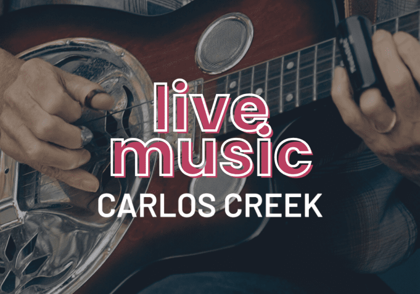 A person playing a resonator guitar in a plaid shirt. Text over the image reads, "live music CARLOS CREEK" with Friday night vibes at 22 Northmen Brewing.